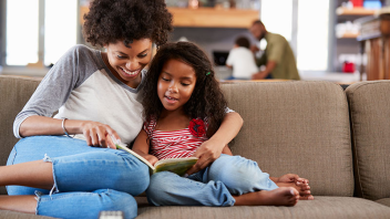 Parent and child reading together
