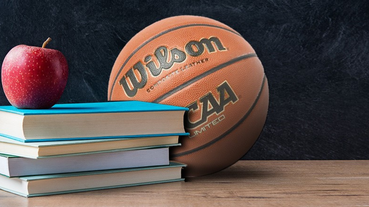 Basketball next to books