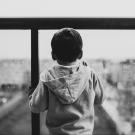 Child looking out the window