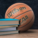 Basketball next to books